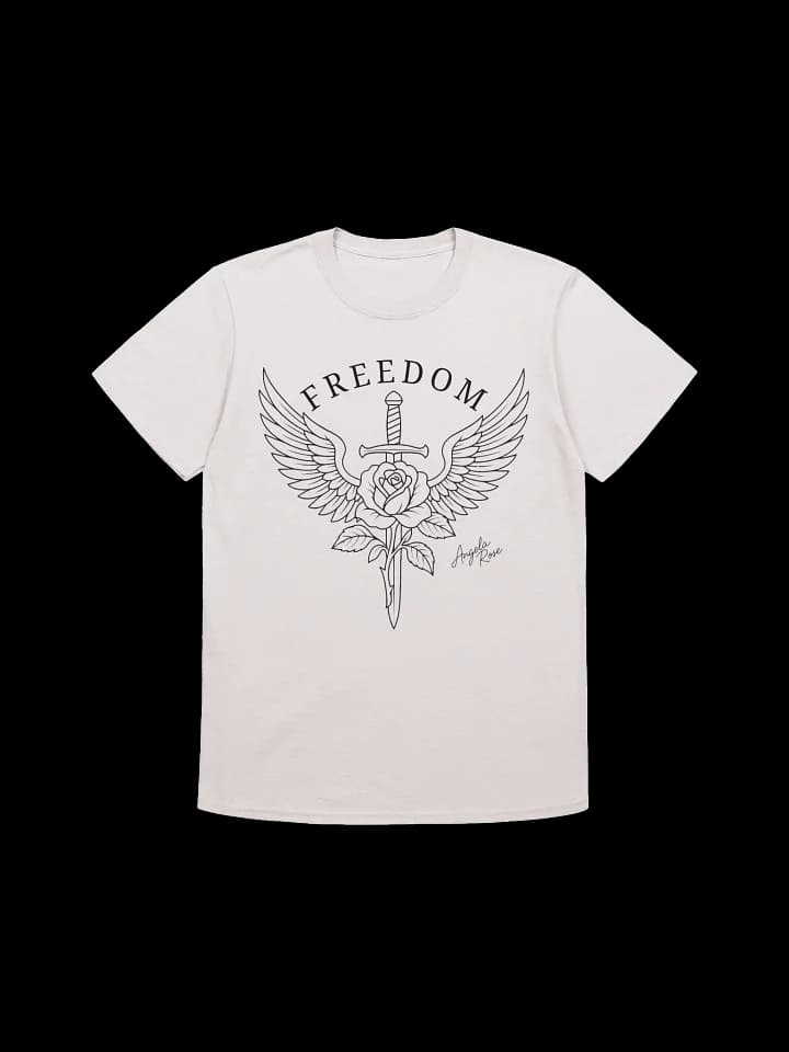 Cream T-shirt with a line-art winged sword and rose under the word FREEDOM